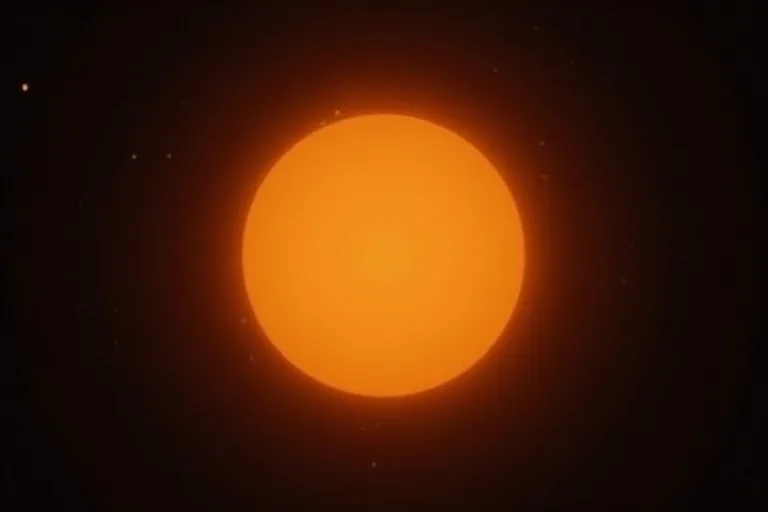 En ljusstark sol mot en mörk rymdbakgrund som visar solen som en stjärna.